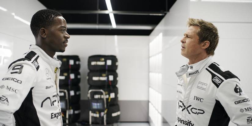 Joshua and Sonny talking in their uniforms in F1: The Movie