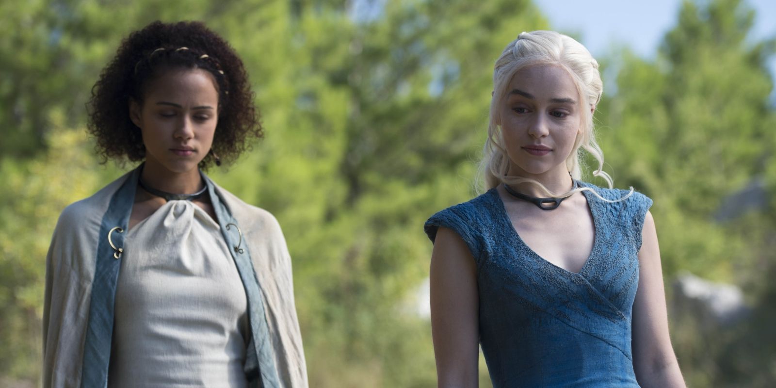 Missandei (Nathalie Emmanuel) walking with Daenerys (Emilia Clarke) in Game of Thrones