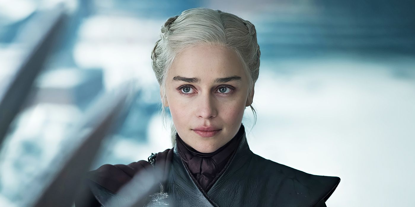Emilia Clarke as Daenerys Targaryen looking at the Iron Throne in Game of Thrones.