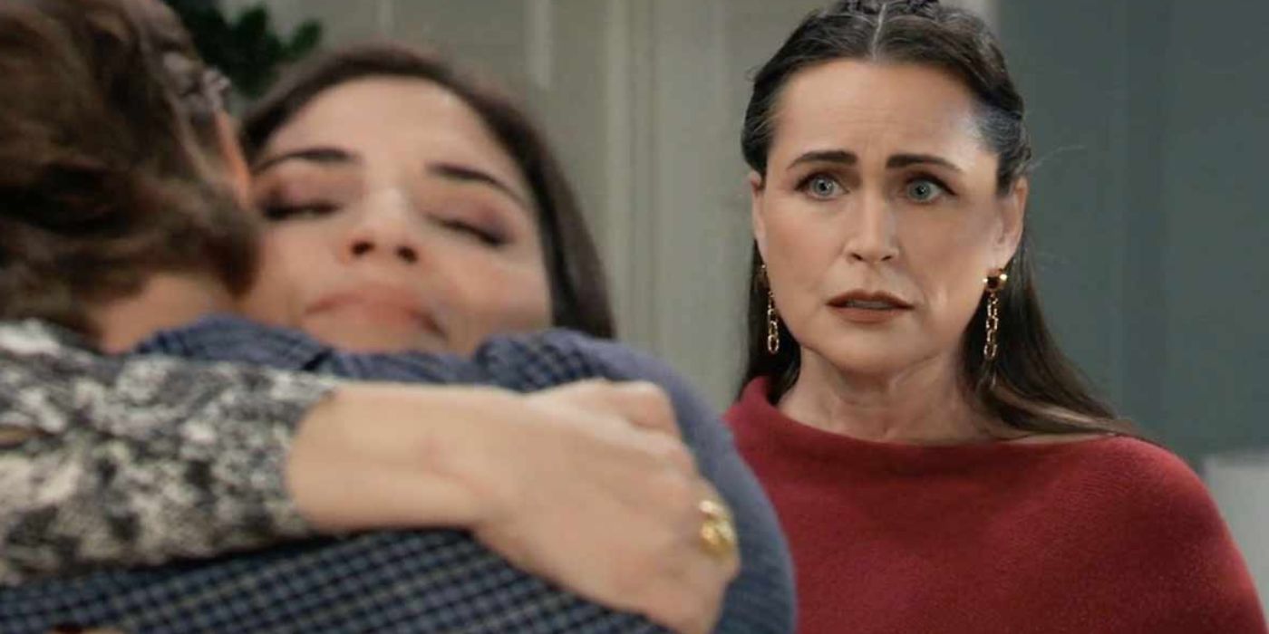 Rena Sofer's Lois watches an unknowing Brook Lynn (Amanda Setton) hug her son, Gio (Giovanni Mazza0 on ABC's General Hospital.