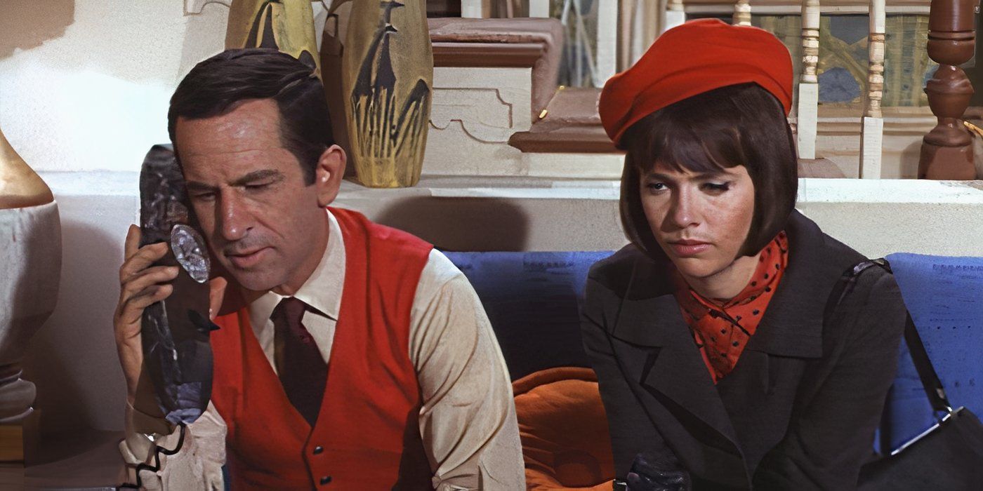 Don Adams as Maxwell Smart and Barbara Feldon as Agent 99 listen to a phone call in 1965's Get Smart.