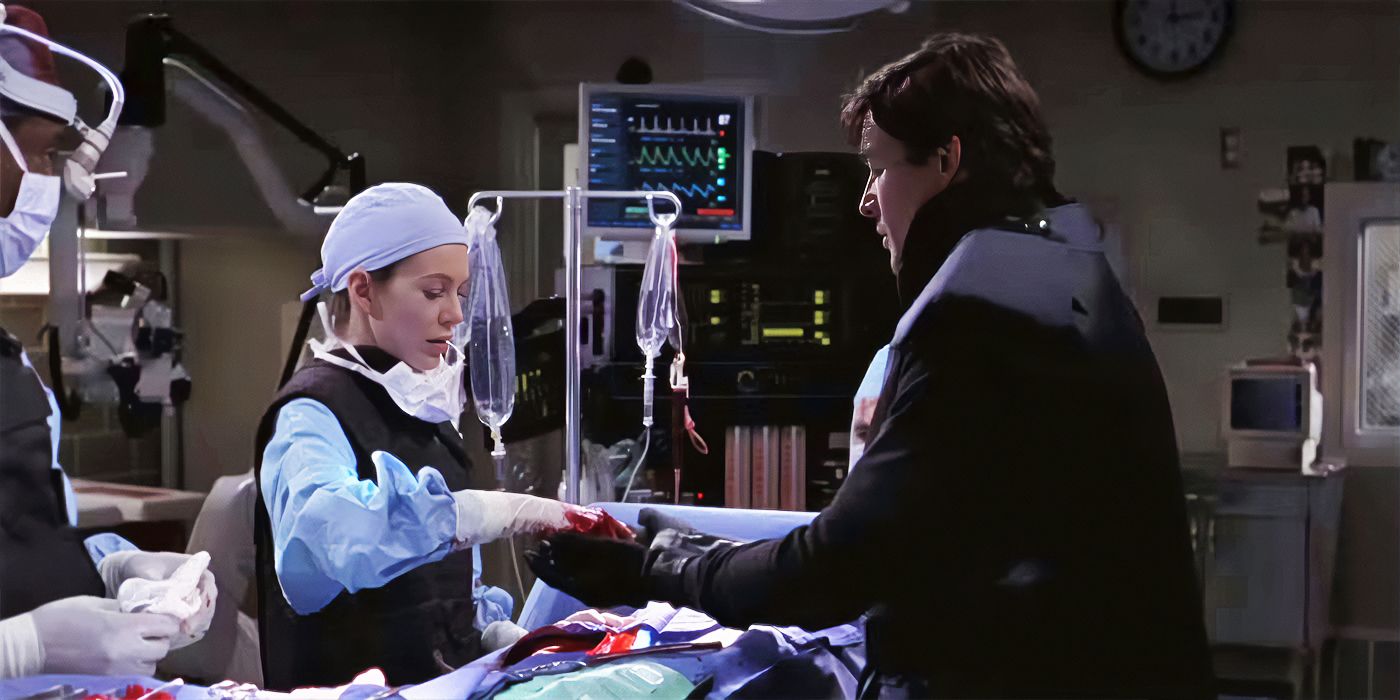 Meredith Grey (Ellen Pompeo) carefully passes an explosive to Dylan Young (Kyle Chandler) in Grey's Anatomy.