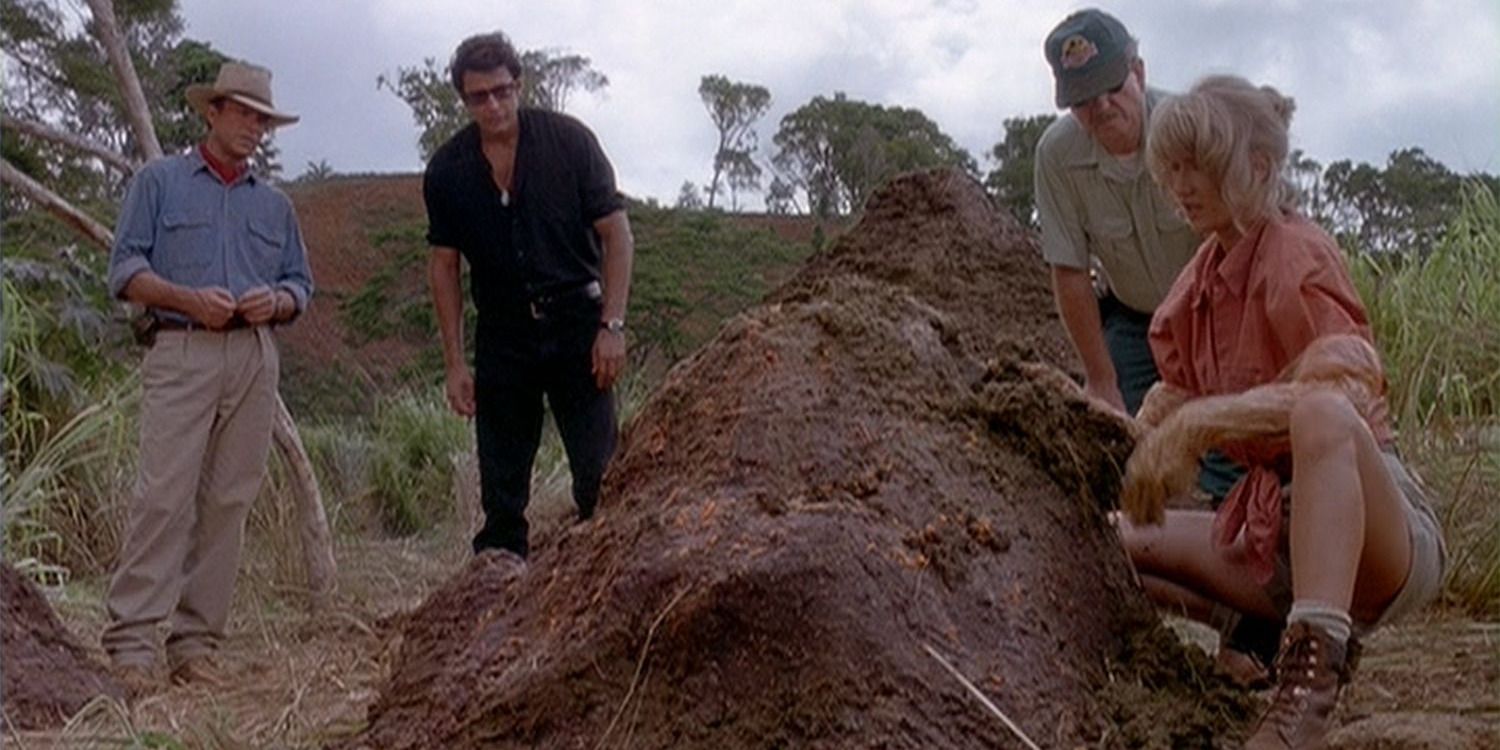 Group looking at dinosaur poop in 'Jurassic Park'