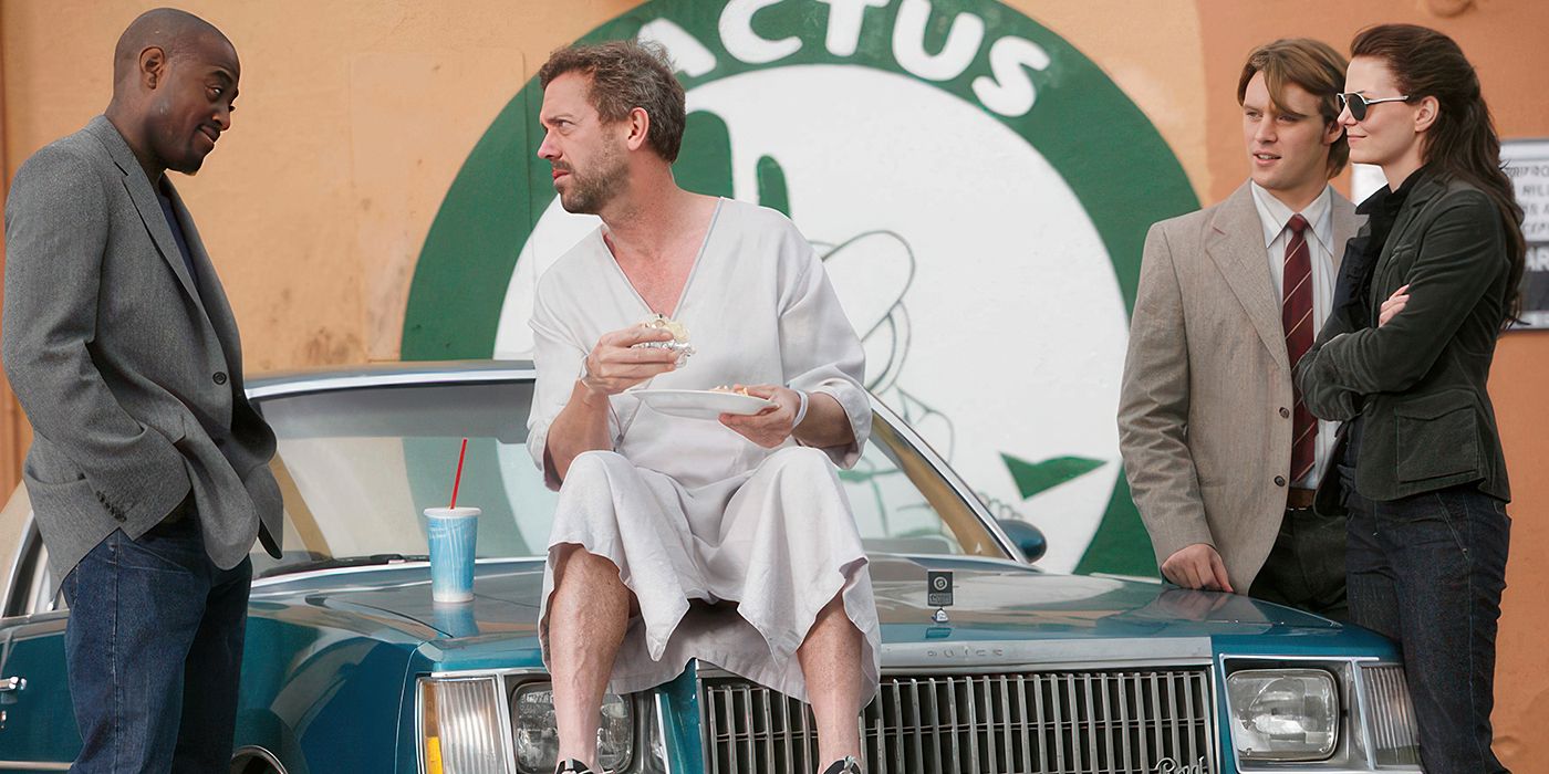 Grega nams, ēdot burrito uz automašīnas