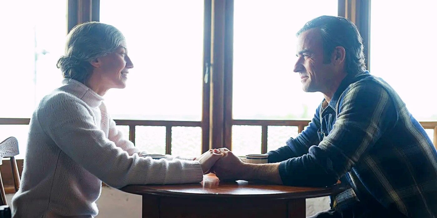 Carrie Coon as older Nora Durst and Justin Theroux as older Kevin Garvey holding hands across a table in the series finale of The Leftovers