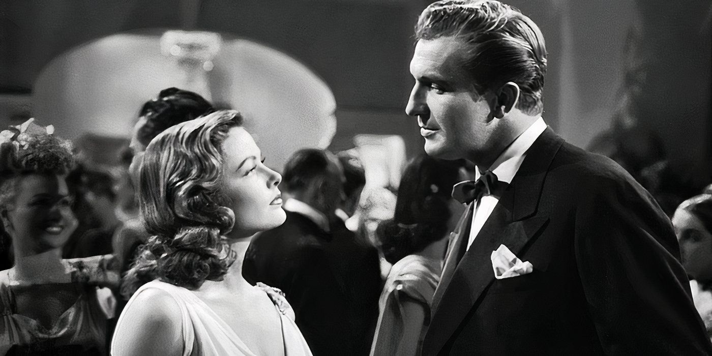 Dana Andrews and Gene Tierney looking at each other at a party in 'Laura' (1944).