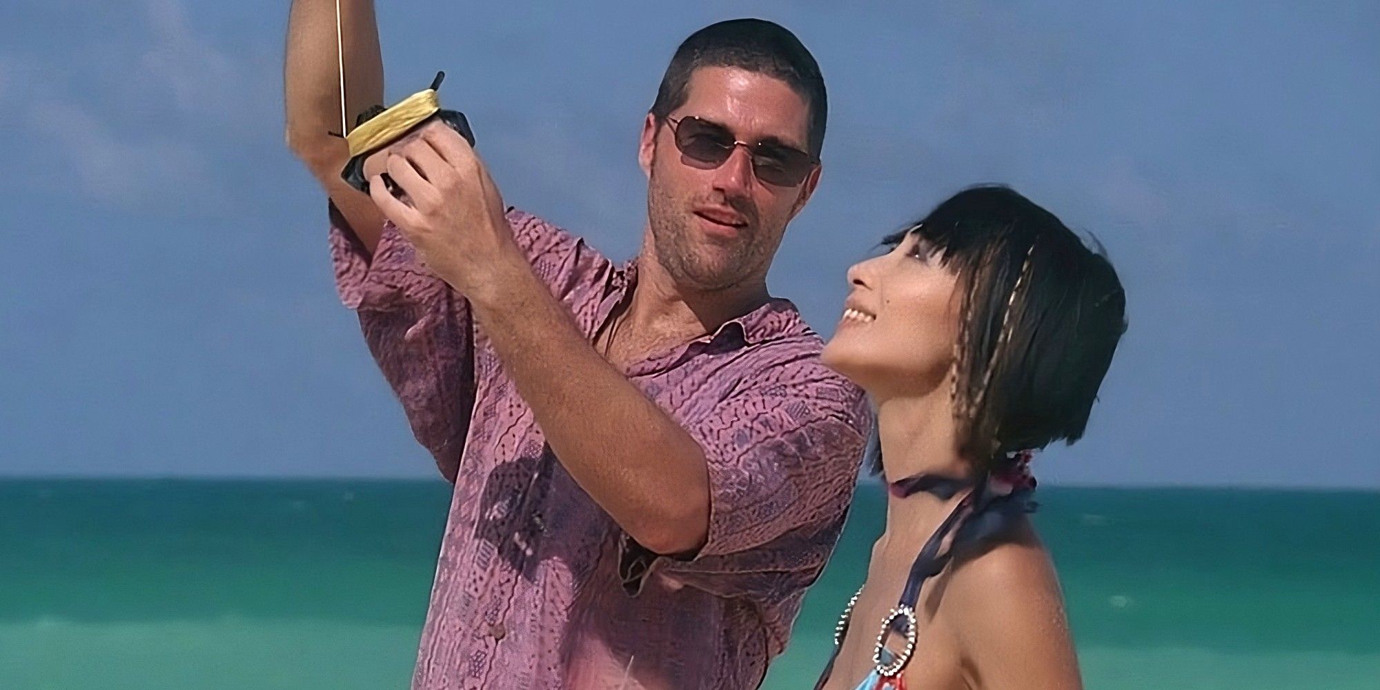 Matthew Fox and Bai Ling as Jack and Achara flying a kite in Lost.