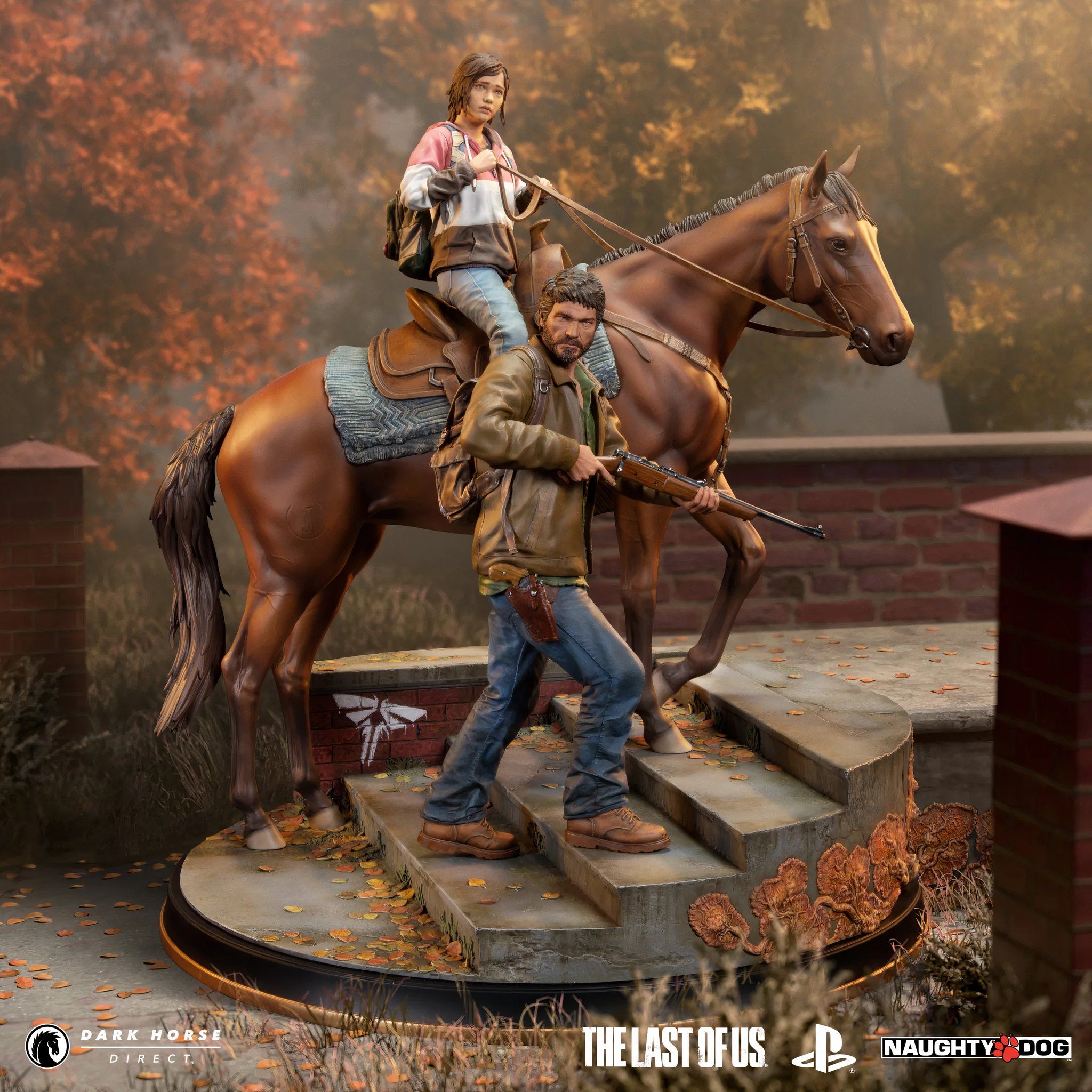 Dark Horse Direct premium statue of The Last of Us: Joel and Ellie on Horseback with a woodsy background
