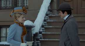 Marian (Louisa Jacobson) and Larry (Harry Richardson) standing in the snow in The Gilded Age Season 3