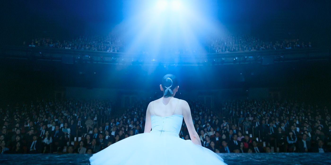 Min-hee faces an audience after collapsing during a ballet performance in Ballerina 2023
