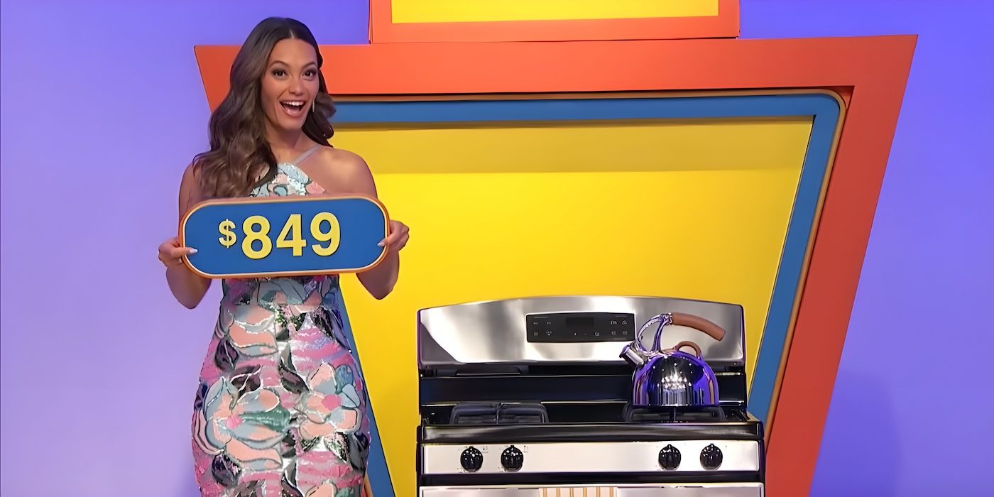 Model Gaube shows the price tag for the range on The Price Is Right.