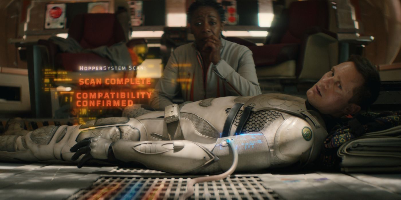 Mensah watching over an injured Murderbot