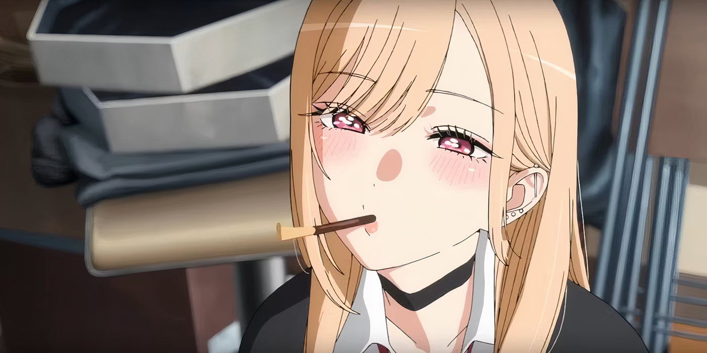 Marin holding a Pocky in her mouth in My Dress-Up Darling Season 2