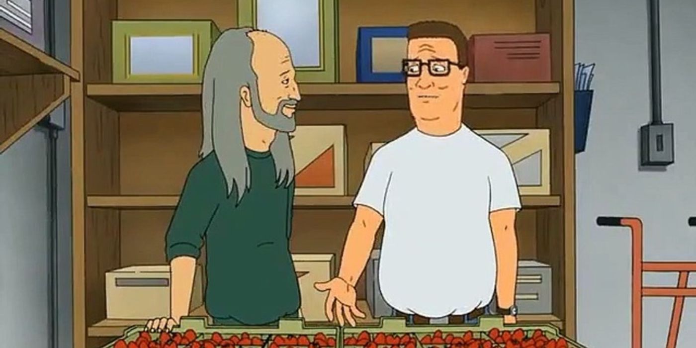 Hank talks to a man with long gray hair with produce in front of them in King of the Hill.