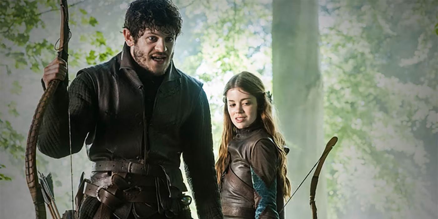 Ramsay Bolton and Myranda stand in the woods with bows