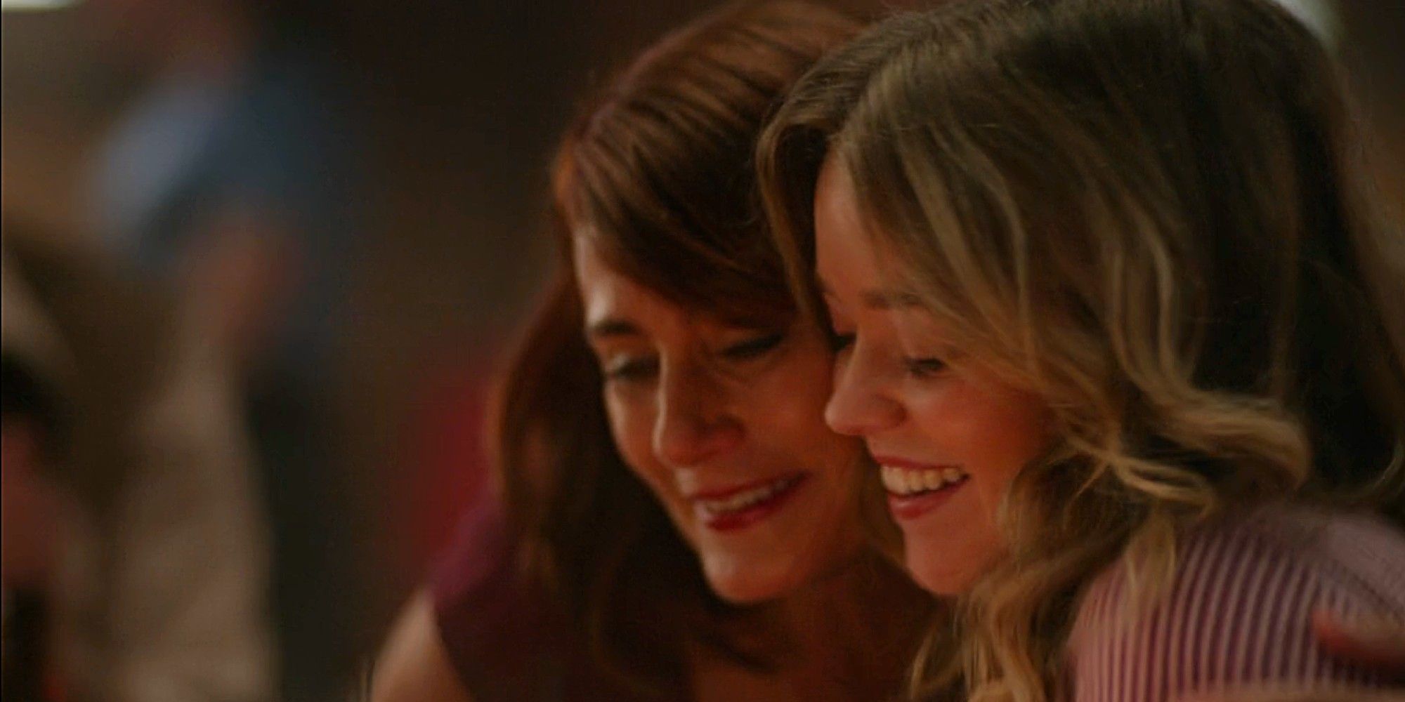 Sharon and Riley Leone smiling and hugging in Fire Country