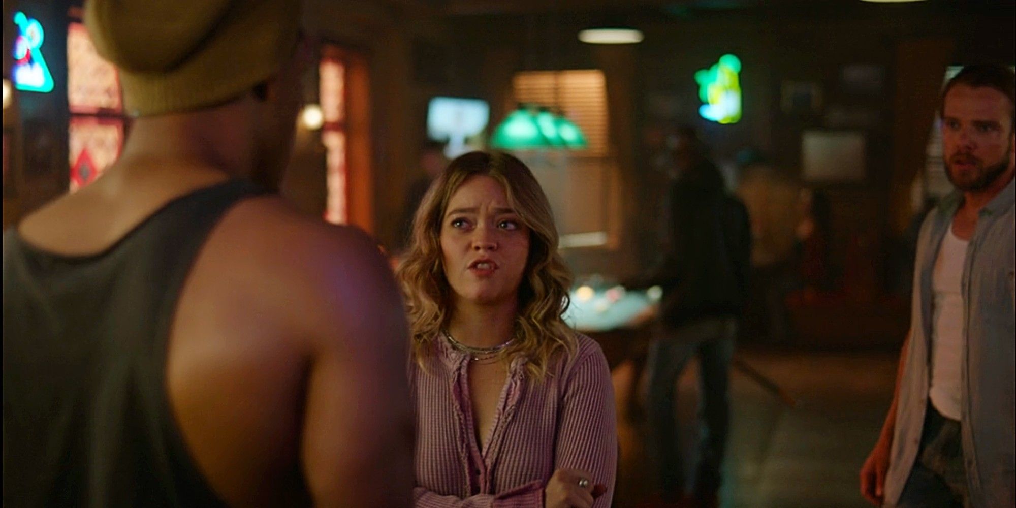 Riley Leone and Jake Crawford arguing while Bode Leone watches in Fire Country