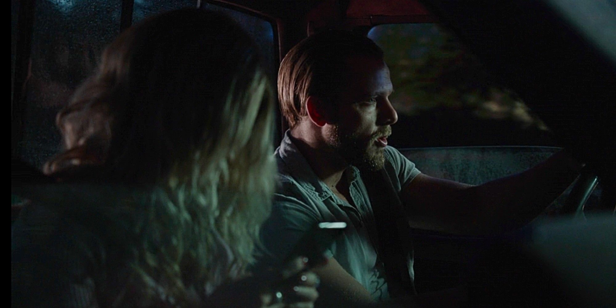 Bode Leone driving a car while Riley Leone sits next to him on her phone in Fire Country