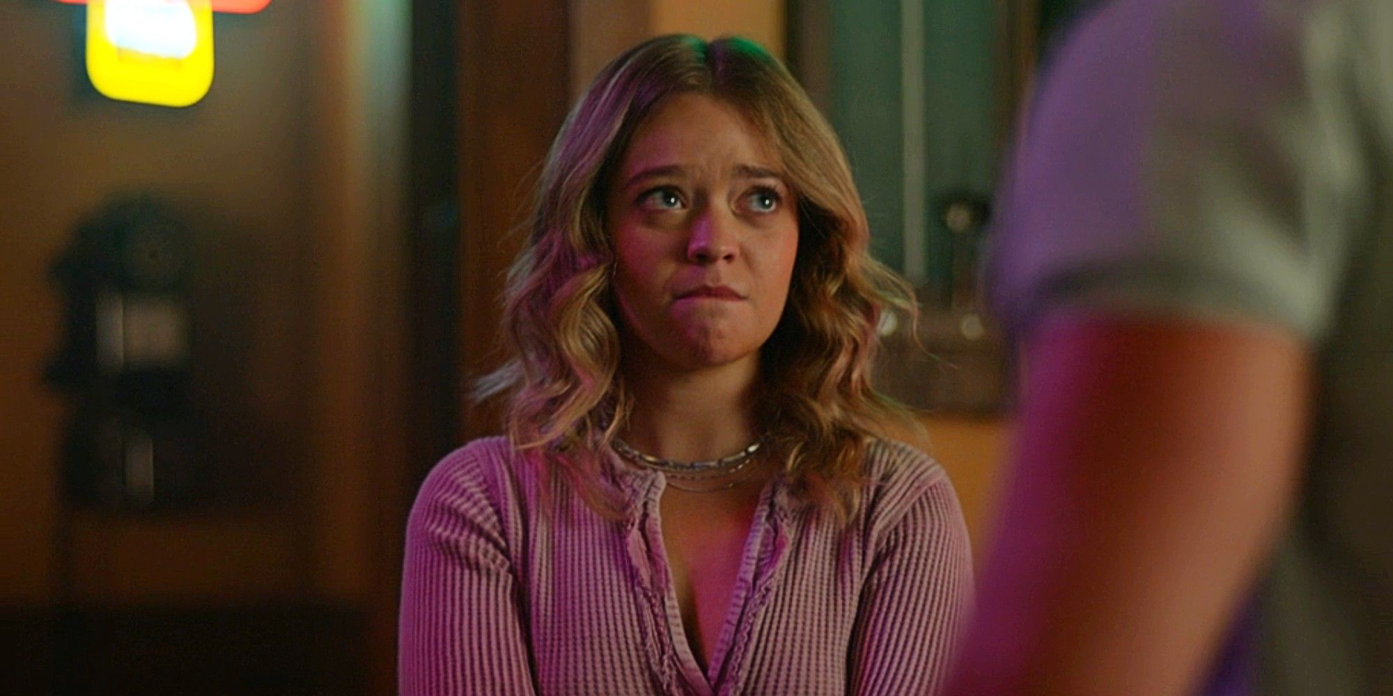 Riley Leone looking sad while talking to Bode in Fire Country