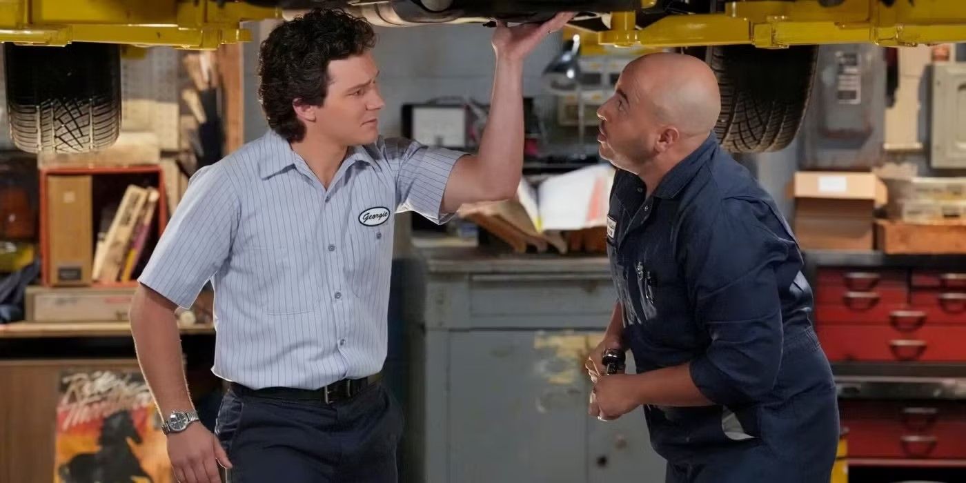 Ruben (Jessie Prez) and Georgie (Montana Jordan) seen working under a car in Georgie & Mandy's First Marriage.