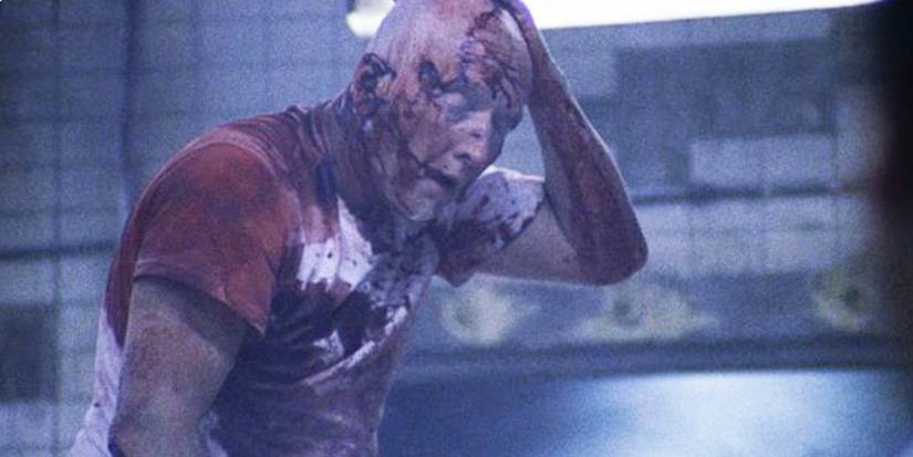 Tobin Bell as Jigsaw revelas himself in the ending to Saw.