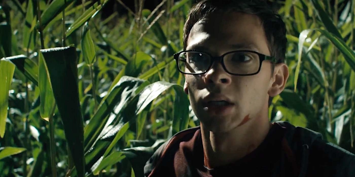 Scott (Devon Graye) tries to escape the cornfield in the horror movie Husk (2011).
