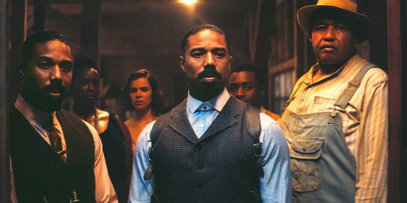 The cast of Sinners, standing at the door of the juke joint.