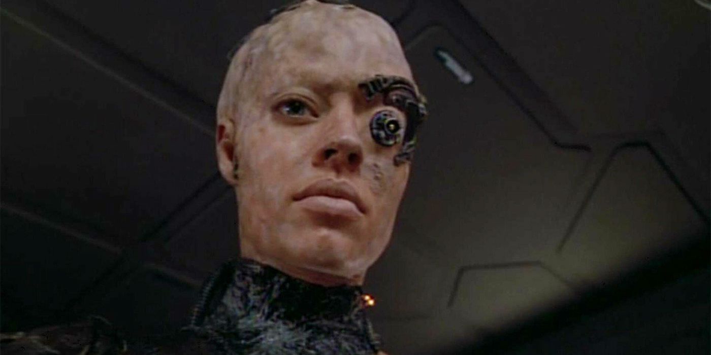 A partially assimilated Seven of Nine stares off screen in Star Trek: Voyager "The Gift".