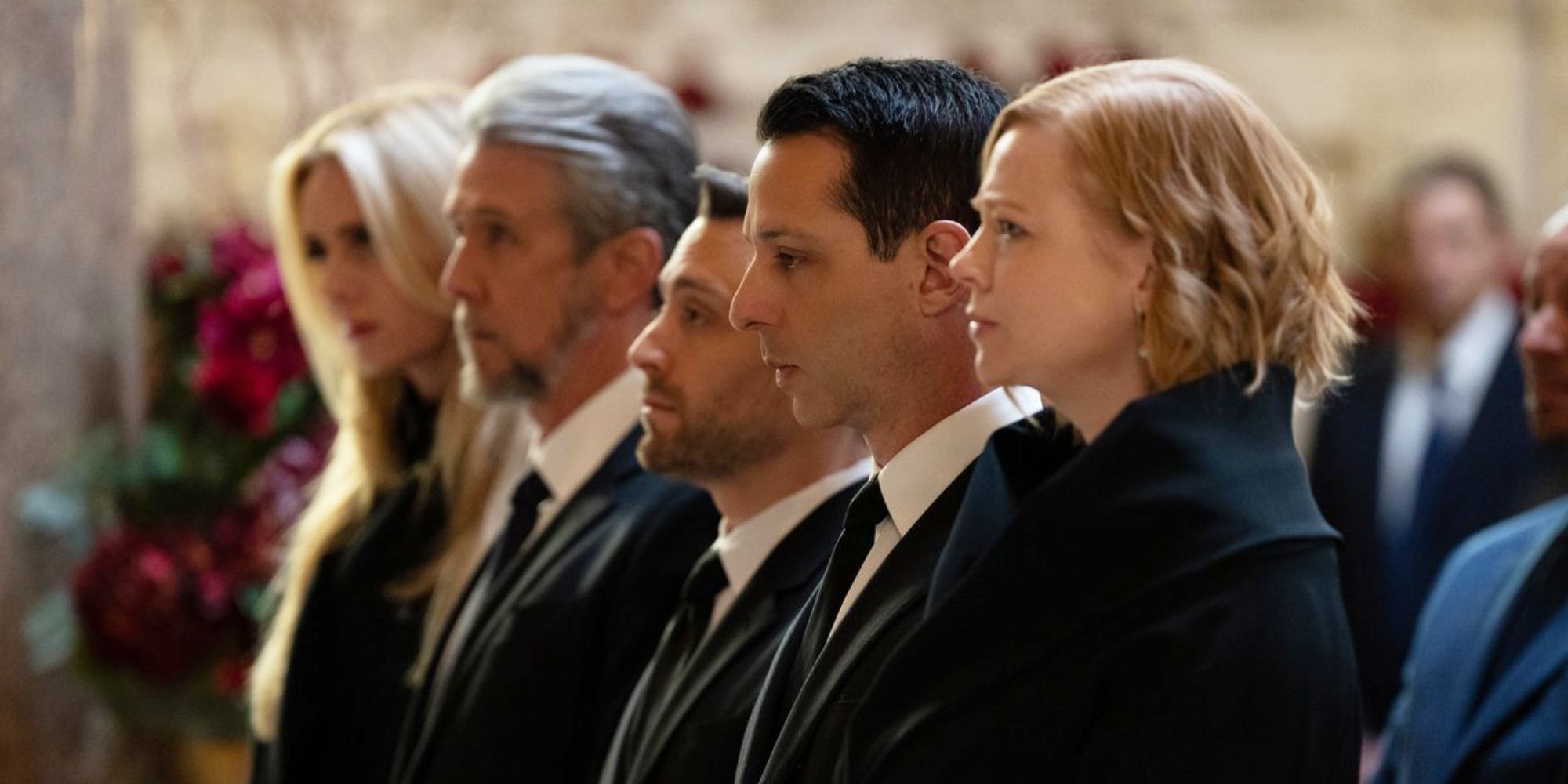 The cast members looking somber in the pew of a church in Succession episode Church and State.