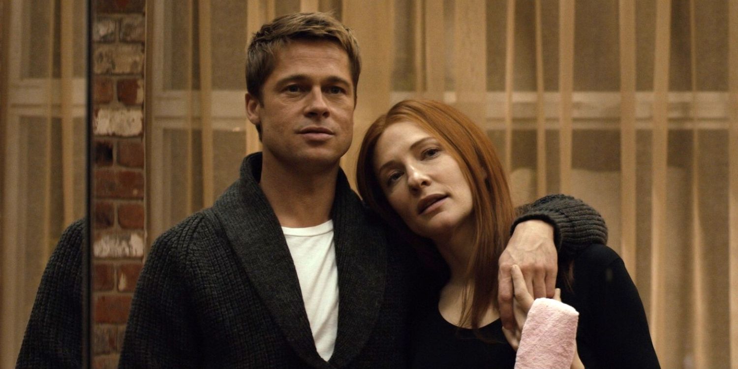 Brad Pitt with his arm around Cate Blanchett in an elevator in The Curious Case of Benjamin Button, 2008.