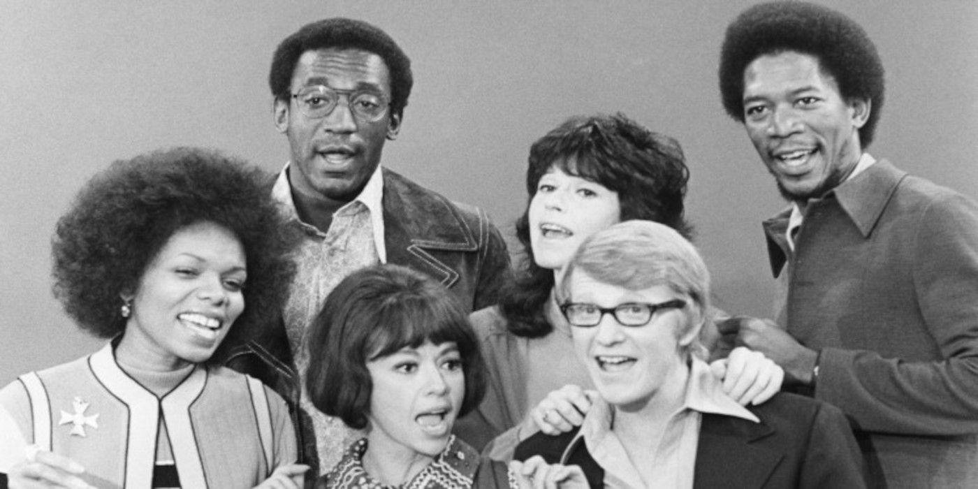 The original cast of The Electric Company pose for a photo.