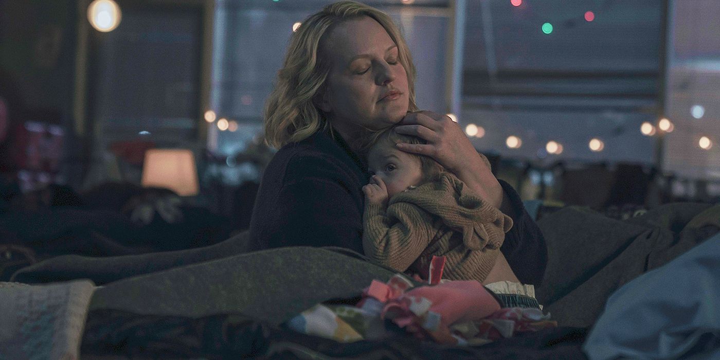 Elisabeth Moss as June hugging her daughter Holly in The Handmaid's Tale