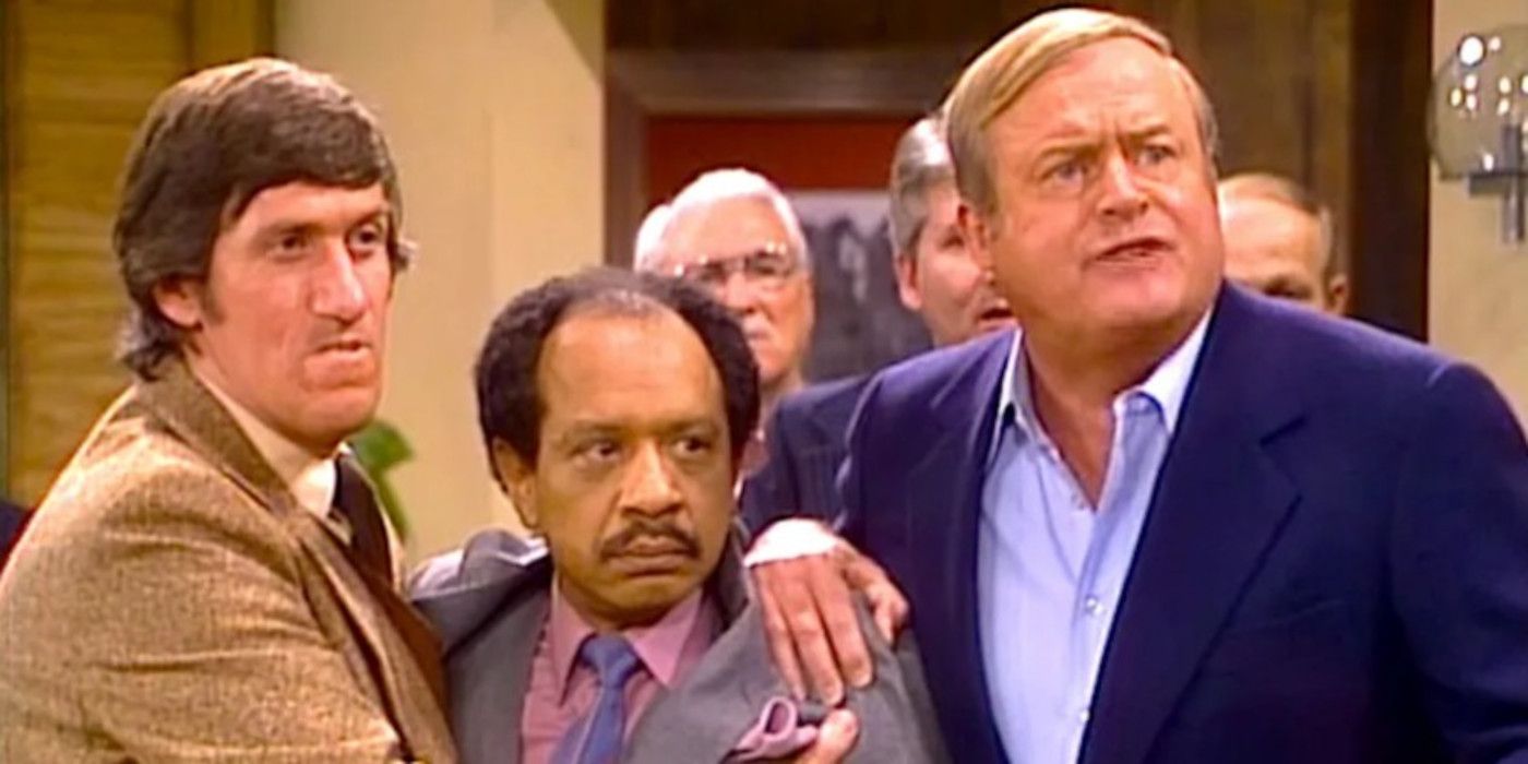 George is held back by Tom and Harry in The Jeffersons.