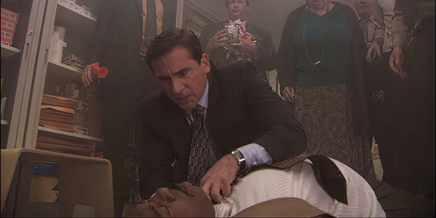 Michael Scott (Steve Carell) checks on an unconscious Stanley (Leslie David Baker) on 'The Office'