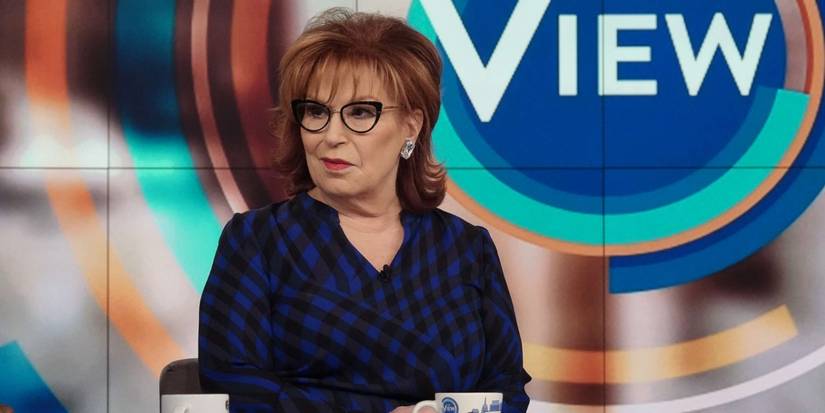 Joy Behar with 'The View' logo behind her.
