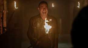 Negan (Jeffrey Dean Morgan) laughs while holding a torch in 'The Walking Dead: Dead City'