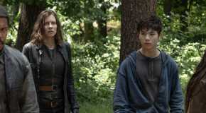 Perlie (Gaius Charles), Maggie (Lauren Cohan), and Hershel (Logan Kim) standing outside in 'The Walking Dead: Dead City'
