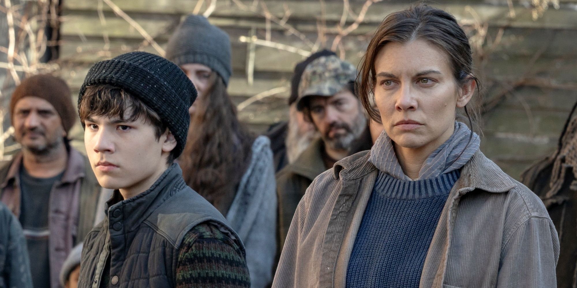 Lauren Cohan as Maggie with Logan Kim as her son Hershel looking angry in The Walking Dead: Dead City Season 2