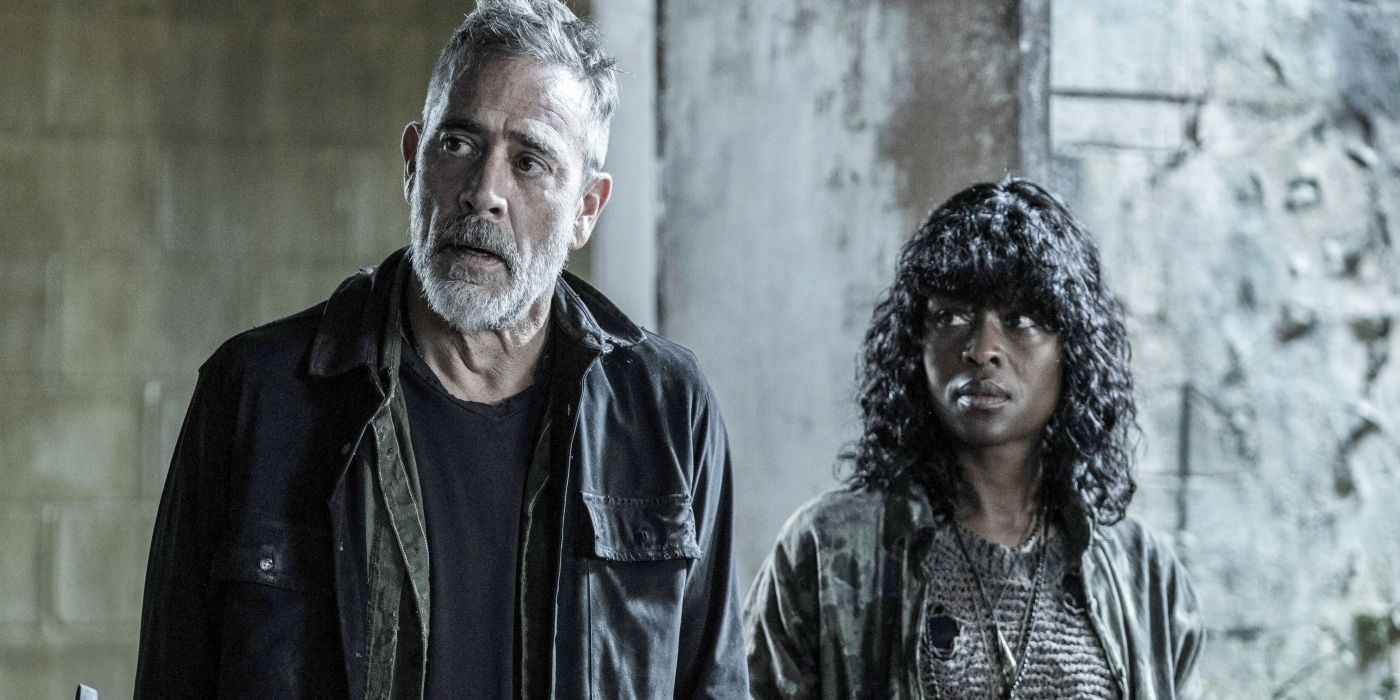Jeffrey Dean Morgan's Negan standing with Medina Senghore's Annie in The Walking Dead