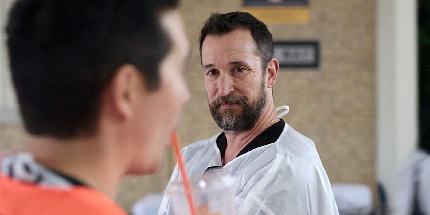 Dr. Robby (Noah Wyle) side eyeing Dr. Shen (Ken Kirby) for drinking iced coffee in episode 112 of The Pitt.