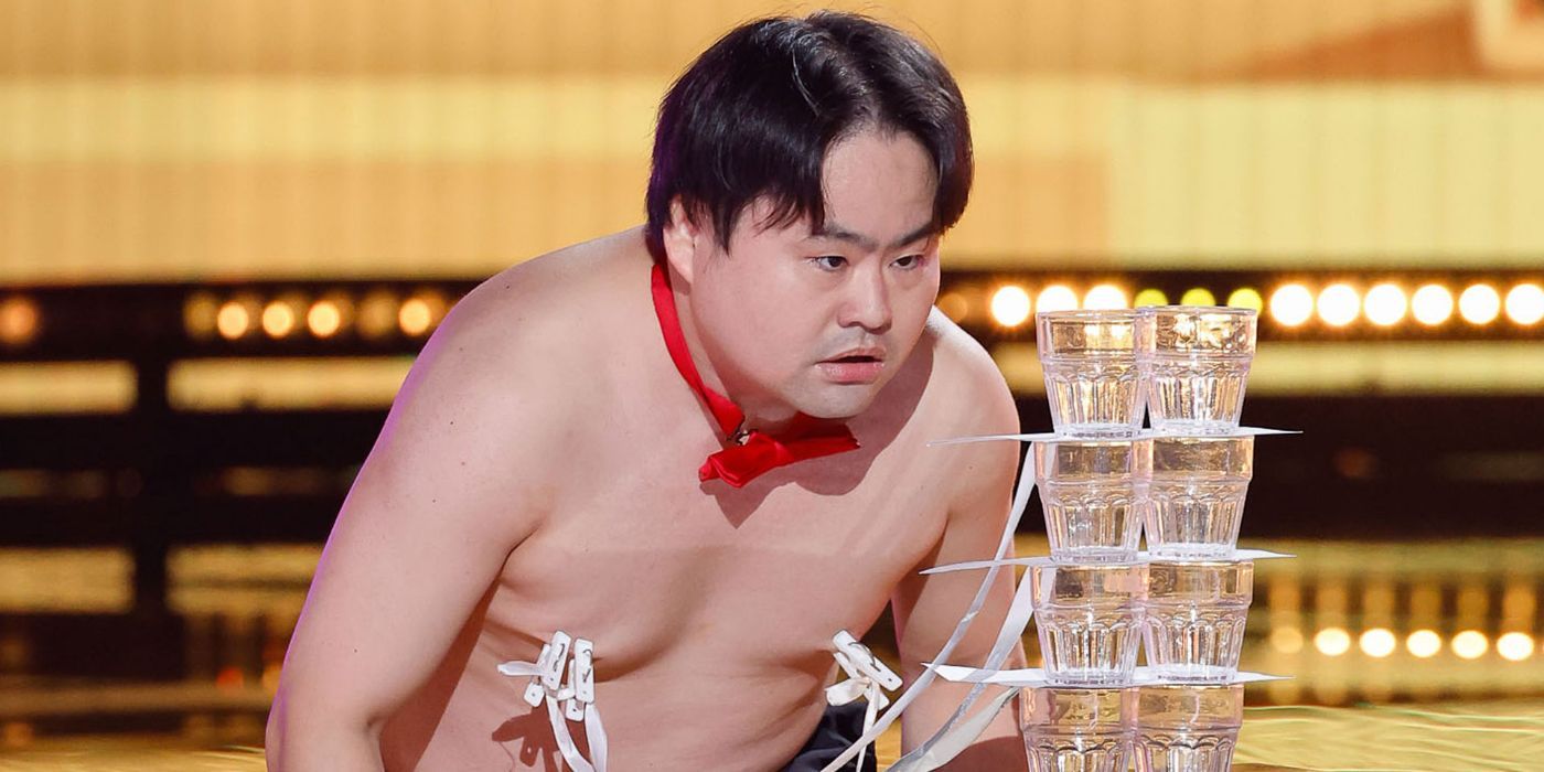Wes P performing with clamps on his nipples and a stack of filled glasses on 'America's Got Talent'
