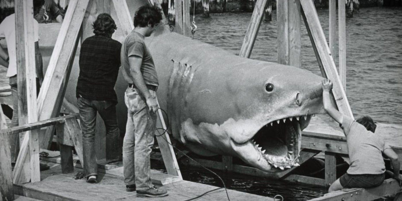 Crew members work on "Jaws' mechanical shark in 'Jaws @ 50'