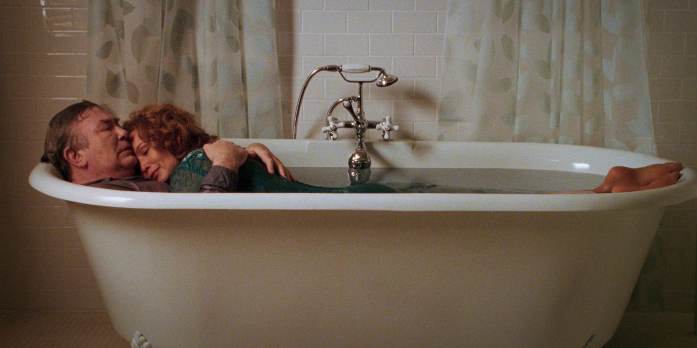 Sandra and Edward hold one another in a clawfoot tub in Big Fish