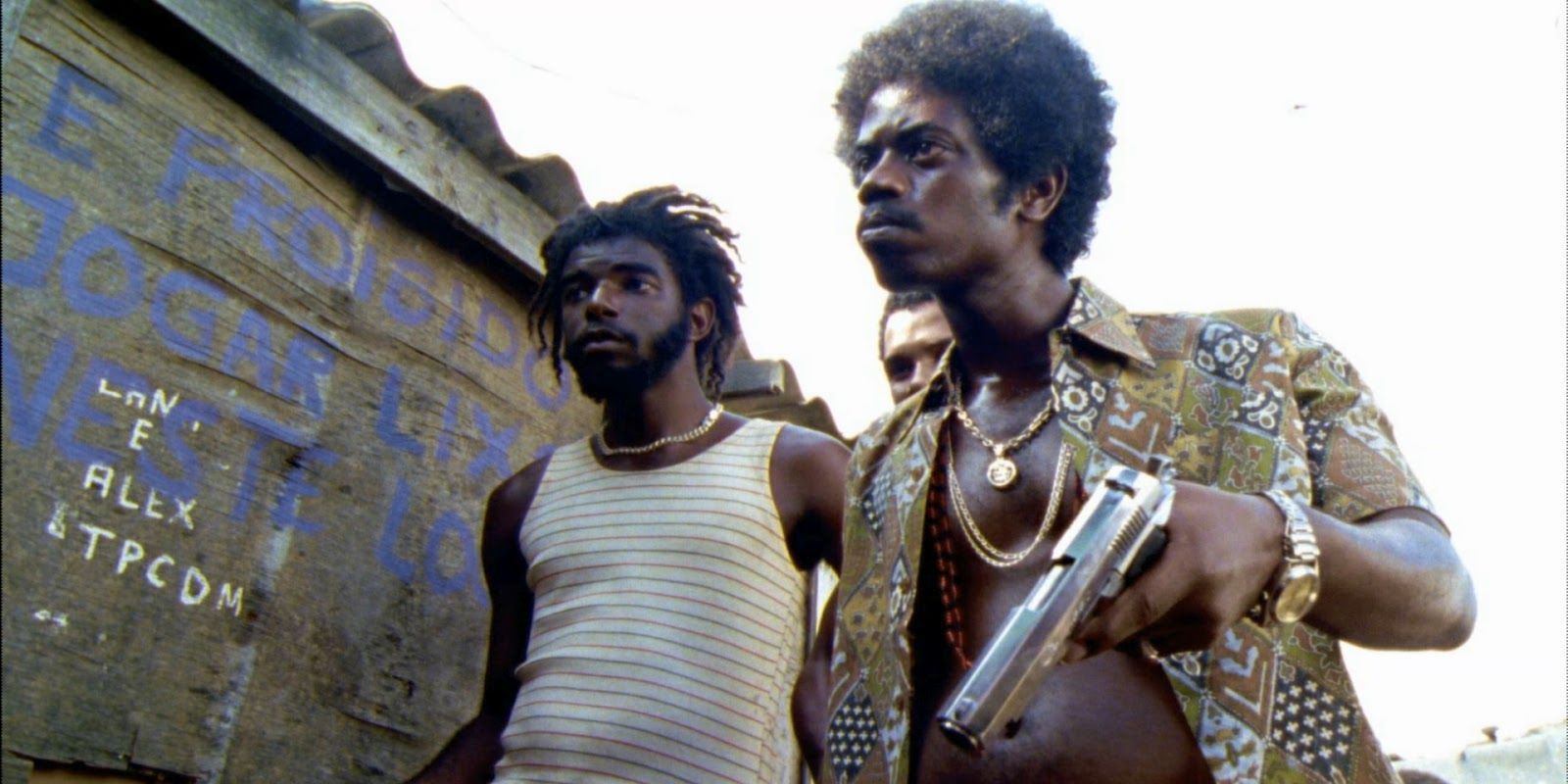 Two Black men with guns in City of God - 2002