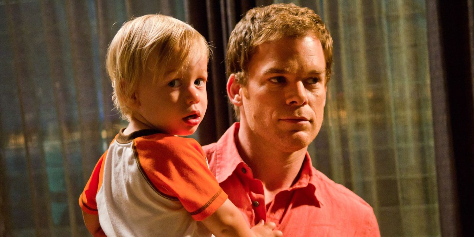 Dexter holding his young son in The Angel of Death (2011).
