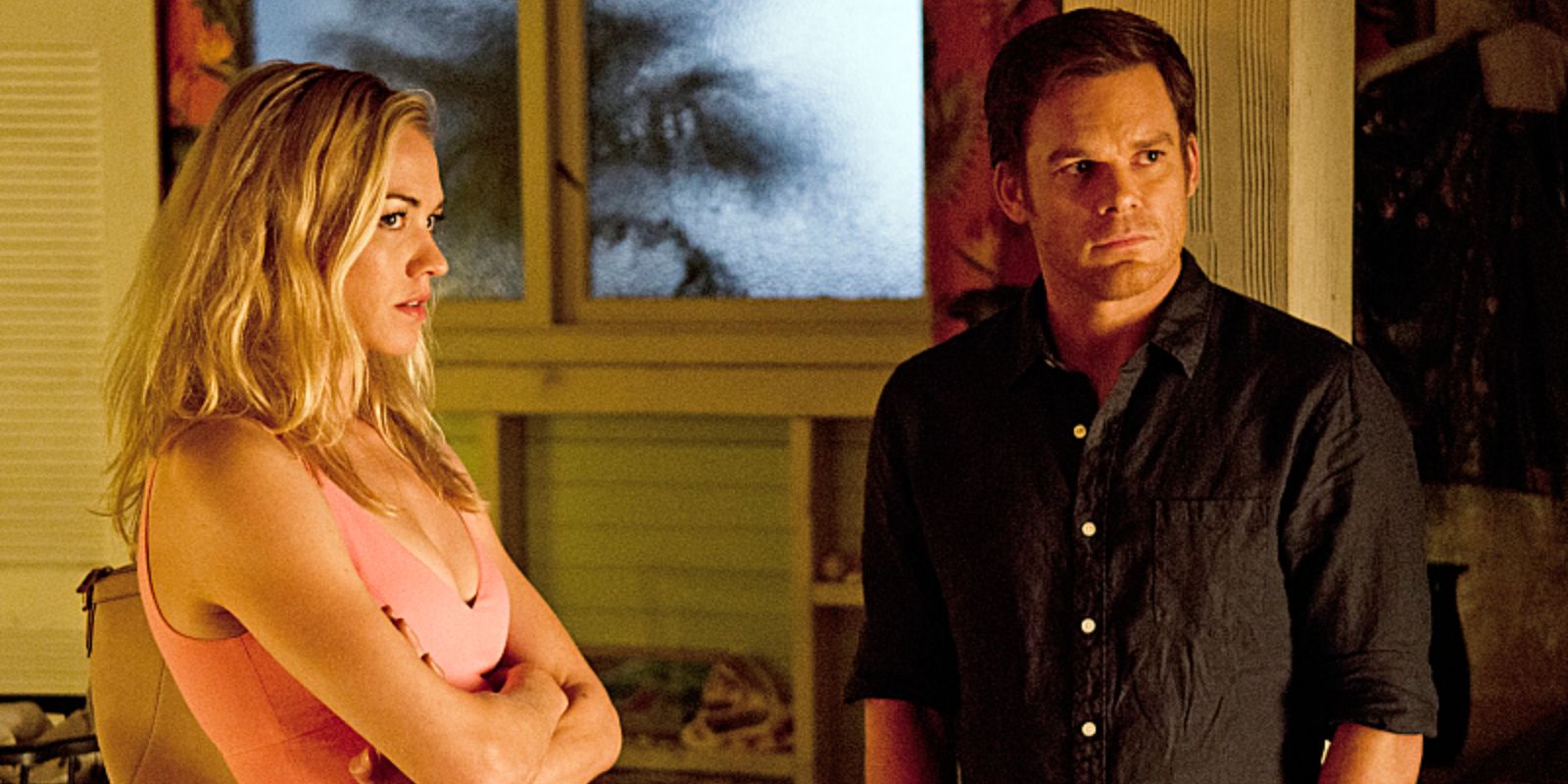 Dexter and Hannah standing together and looking like they're ready for Dexter to end already in Make Your Own Kind of Music (2013)