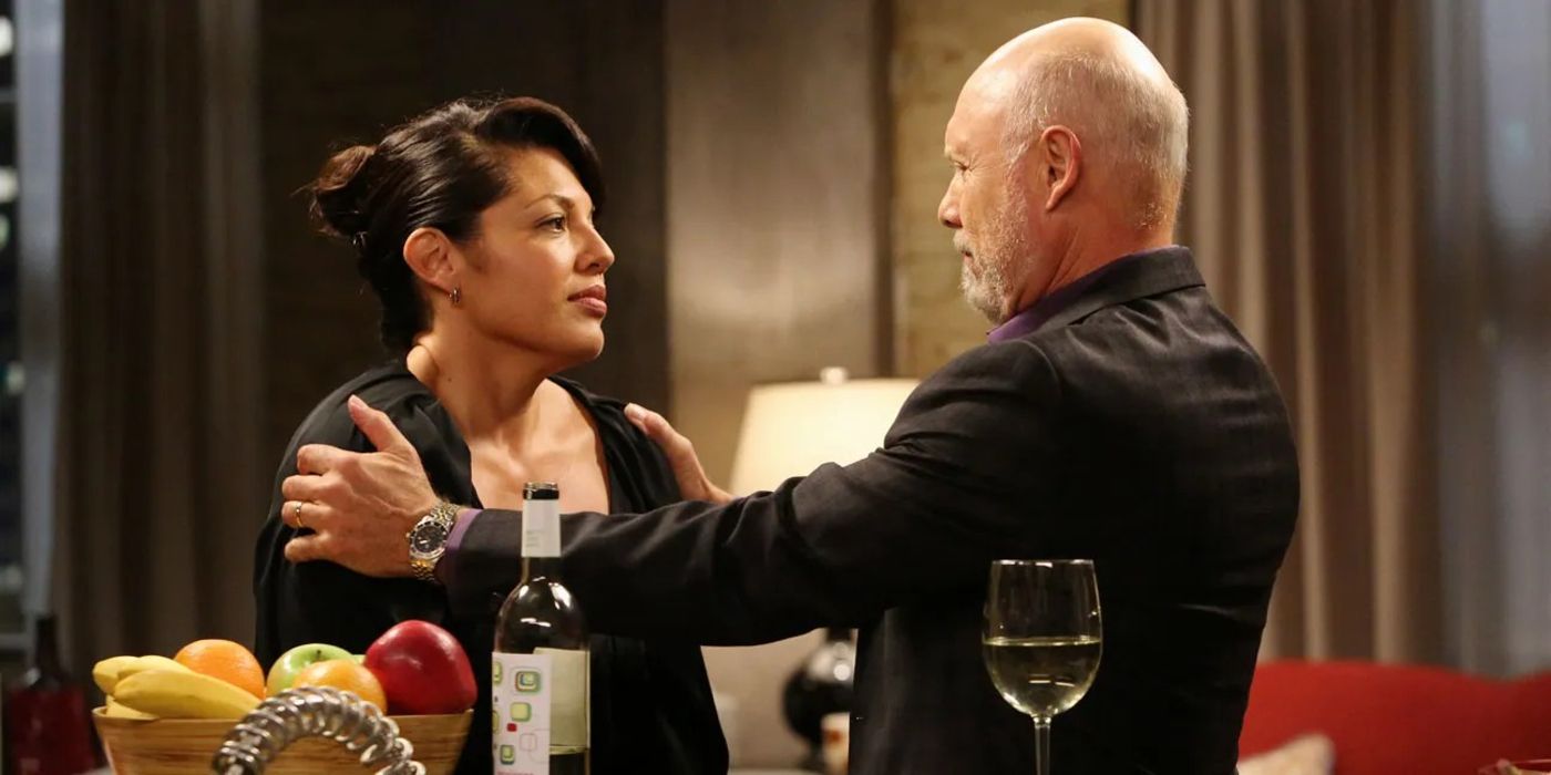 Sara Ramirez and Hector Elizondo as Callie and a consoling Carlos in Grey's Anatomy.