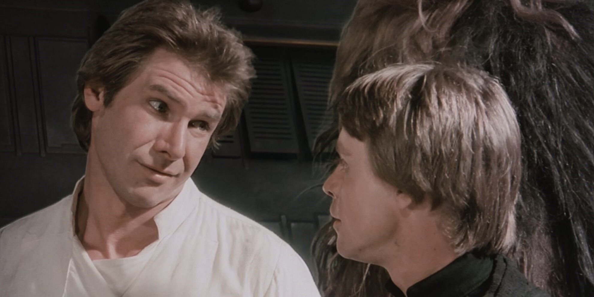 Han-Solo-talking-to-Luke-Skywalker-with-chewbacca-behind-them