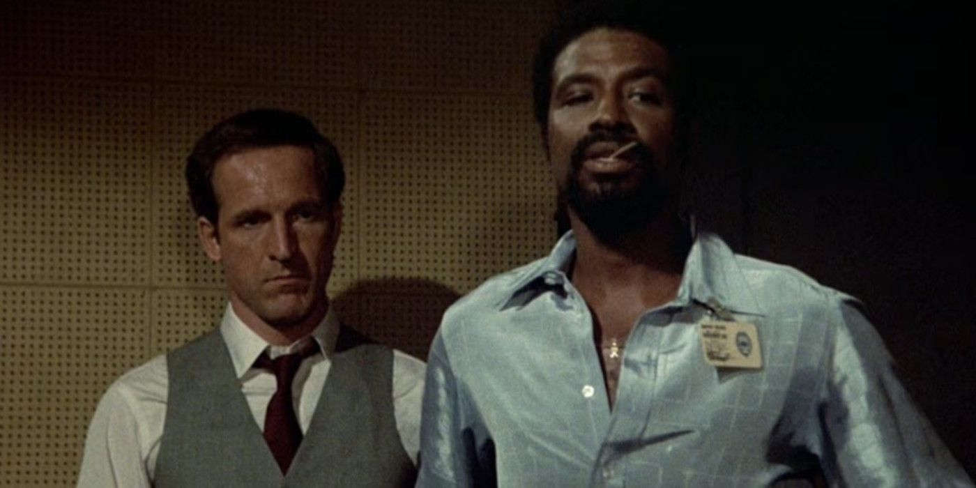 Captain Frank Furillo looks on sternly in an interrogation room in Hill Street Blues. 