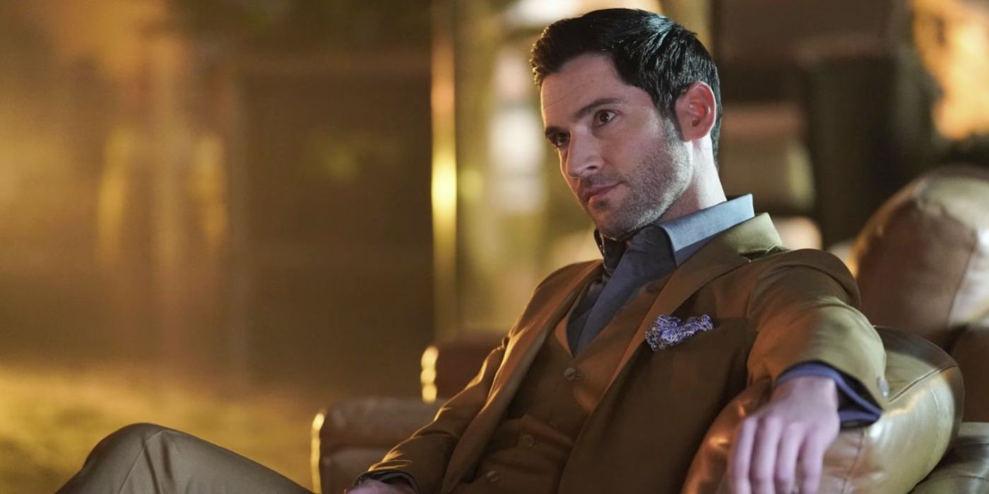 Tom Ellis as Lucifer in a business suit, sitting and looking off-camera in 'Lucifer'.